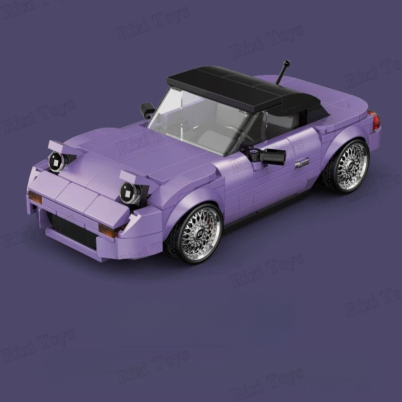 Purple convertible car model made of interlocking bricks on a dark purple background