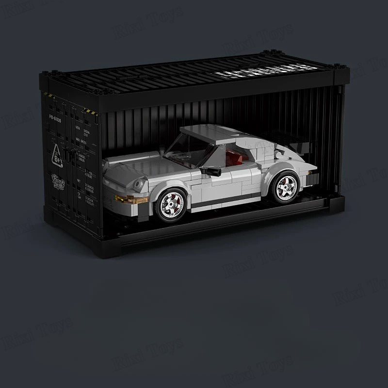 Toy car inside a black shipping container on a dark background