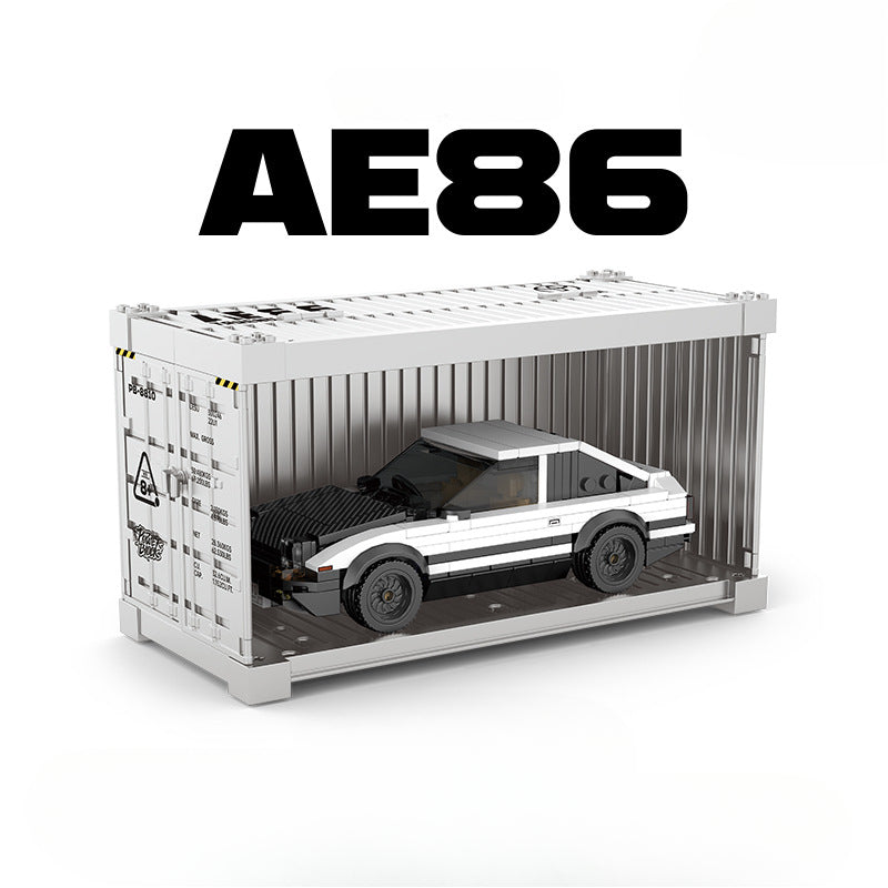 Model of a car inside a shipping container with 'AE86' text on a white background