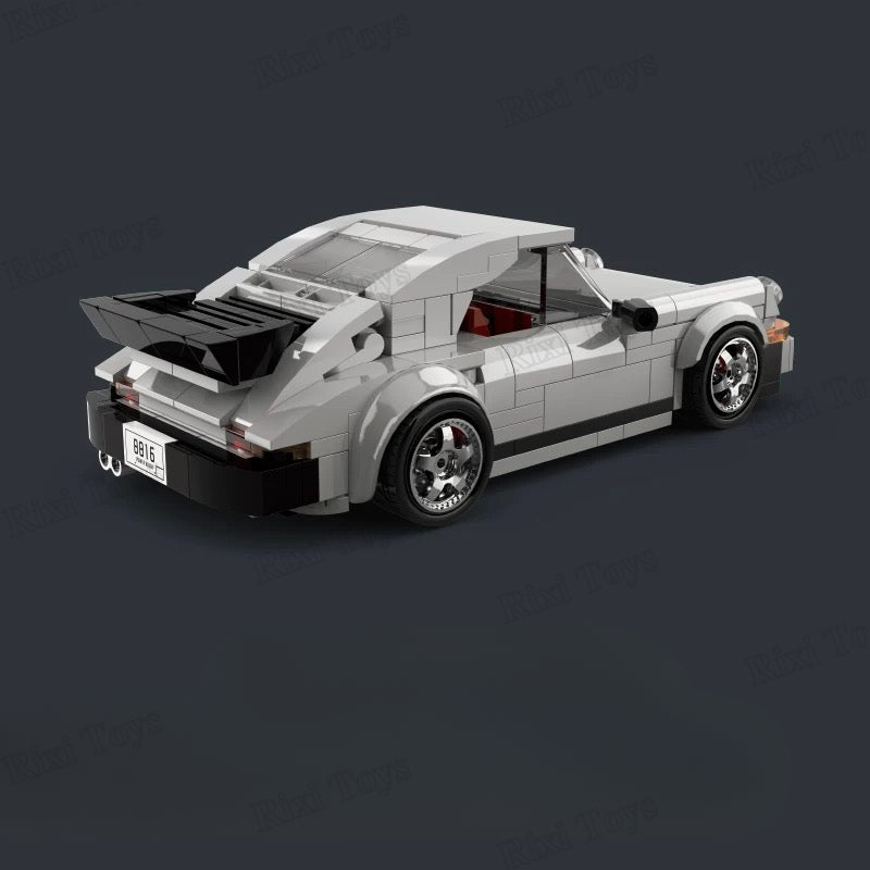 Model car made of interlocking bricks on a dark background