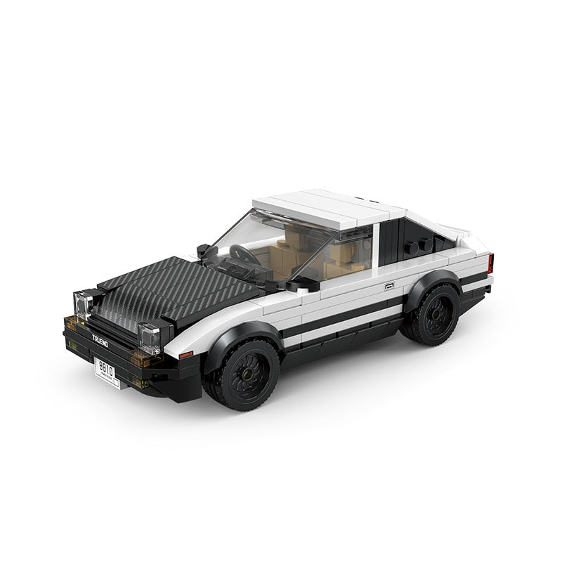 Toy car made of interlocking bricks on a white background