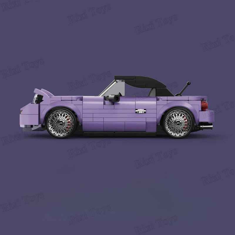 Purple convertible car model made of interlocking bricks on a dark purple background