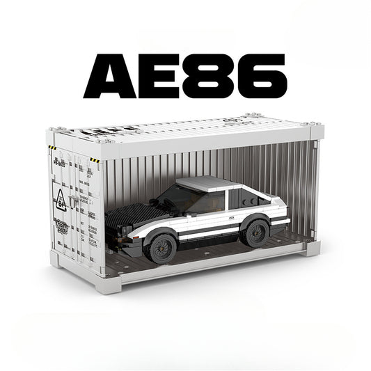 Model of a car inside a shipping container with 'AE86' text on a white background
